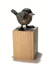 Kunst: vogeltje met visje van kunstenaar Tonny de  Brouwer